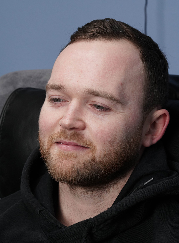 Young man relaxing in treatment chair at Highland Laser Clinicnd Laser Clinic